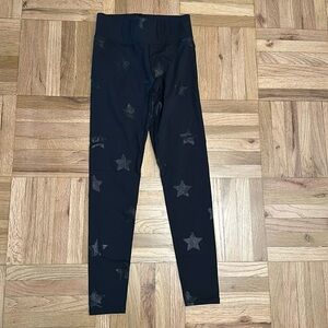 Terez black tonal star foil legging, size XS